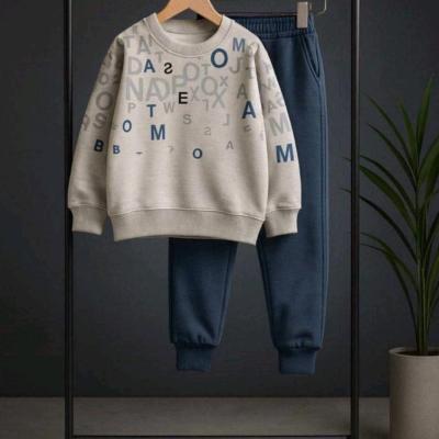 ست بلوز و شلوار بچگانه طرح حروف انگلیسی مناسب 6 تا 15 سال جنس دورس