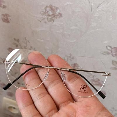عینک طبی بی فریم چند ضلعی رنگ نقره ای