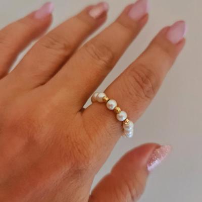 انگشتر مروارید و گوی طلا