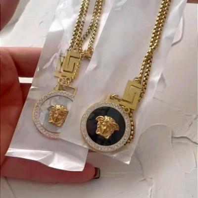 رولباسی ورساچه دورنگین فول استیل، سفید و مشکی