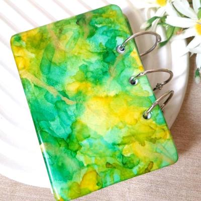 دفترچه رزینی ابروبادی سبز