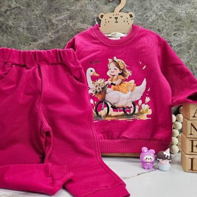 ست بلوز و شلوار دخترانه رنگ سرخابی طرح دختر و قو سایز 35 تا 45