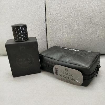 عطر ادکلن بلک افغان 100 میل ( به همراه کیف چرمی)