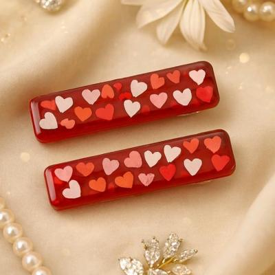 گیره رزینی قرمز قلبی جفتی