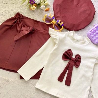 پیراهن دخترانه بلوز دامن دخترانه همراه کلاه کرم و زرشکی