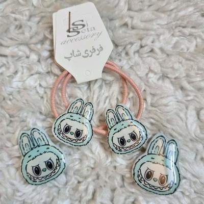 ست کش مو و گیره مو عروسکی دخترانه مدل لبوبو رنگ سبزآبی