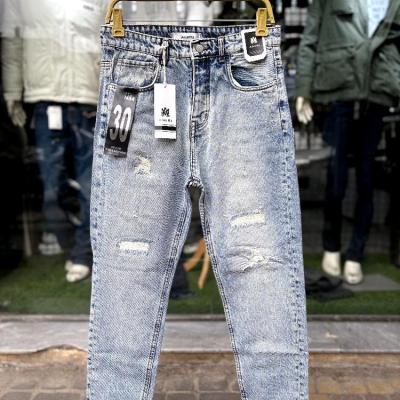 شلوار جین پنبه مام فیت زاپدار رنگ آبی روشن با سایزبندی 31 تا 38