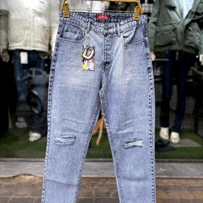 شلوار جین پنبه مام فیت آبی روشن مدل زاپدار با سایزبندی 31 تا 36