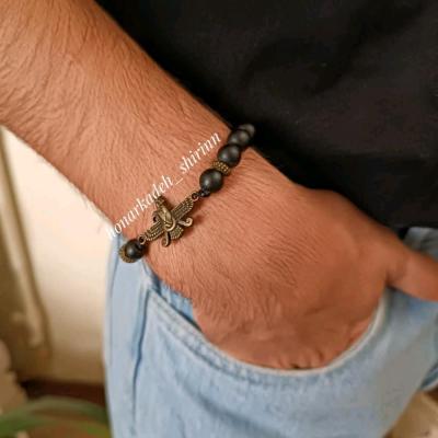 دستبند مردانه سنگ اونیکس مشکی با طرح فروهر