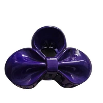 کلیپس مو طرح پاپیون بنفش