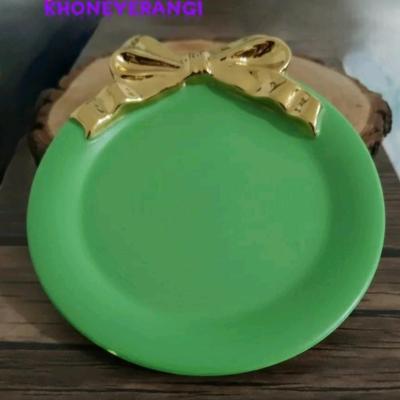 ظرف گرد پاپیونی یا زیر لیوانی پاپیونی