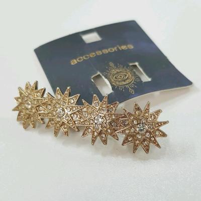 گیره مو کلیپسی طلایی مدل ستاره نگین دار ، بسیار زیبا و درخشان