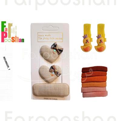 ست کش و گیره مو دخترانه مدل پارچه ای قلبی کد 1-06039 مجموعه 11 عددی