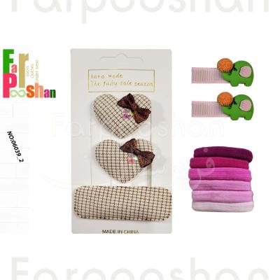 ست کش و گیره مو دخترانه مدل پارچه ای قلبی کد2-06039 مجموعه 11 عددی