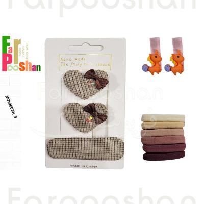 ست کش و گیره مو دخترانه مدل پارچه ای قلبی کد 3-06039 مجموعه 11 عددی