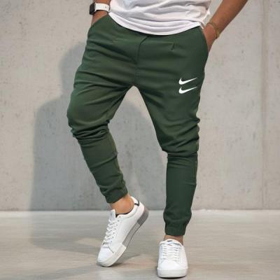 شلوار اسلش بنگال کشی نایک رنگ سبز تیره