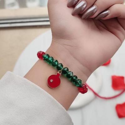 دستبند یلدایی سبز و زرشکی با پلاک انار