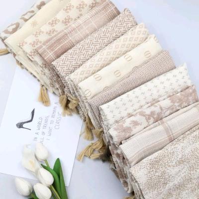 شال بهاره برشکا منگوله دار میکس کرم قهوه ای