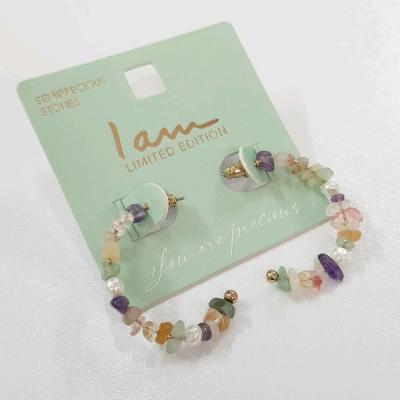 گوشواره نیم حلقه کار شده با سنگ های طبیعی اصل