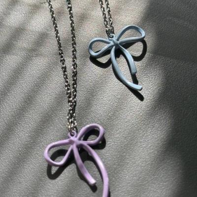 گردنبند پاپیون ترند بنفش و آبی استیل