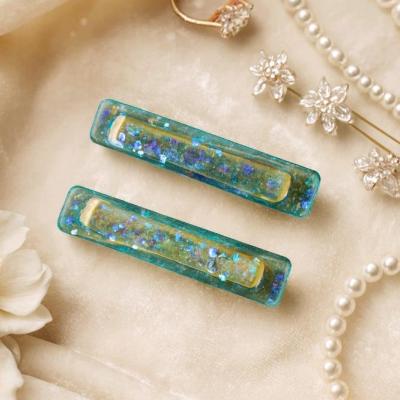 گیره رزینی شفاف اکلیلی شبرنگ