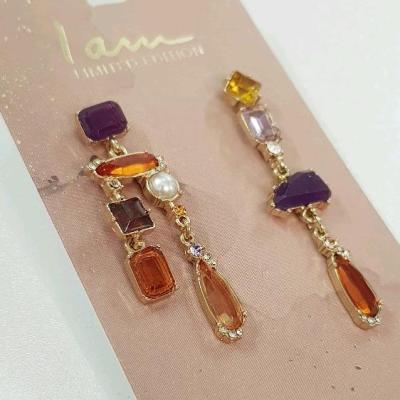 گوشواره طلایی آویز دار کار شده با سنگ های رنگی کریستالی