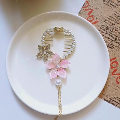 گیره مو گوجه ای و آبشاری طرح گل صورتی وارداتی