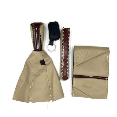 ست دور فرمان دوختنی و سردنده پژو کرم قهوه ای 4 تکه کد S04