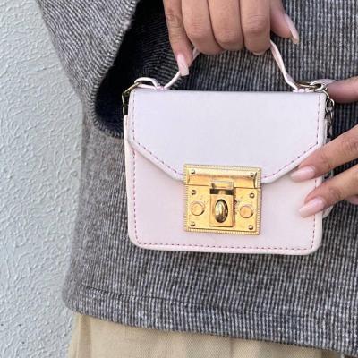 کیف مینی بگ زنجیر دار دارای قفل رنگ گلبهی-151602