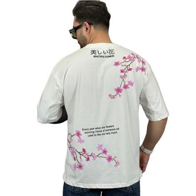 تیشرت آستین کوتاه طرح گل رنگ سفید