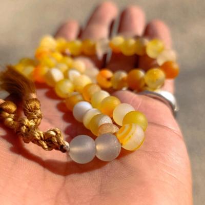 تسبیح عقیق زرد بابا قوری دار