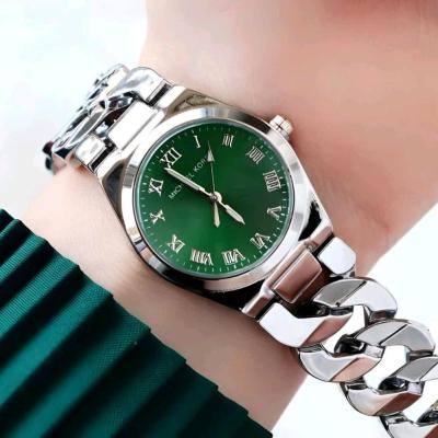 ساعت مایکل کورس صفحه سبز زنانه و دخترانه
