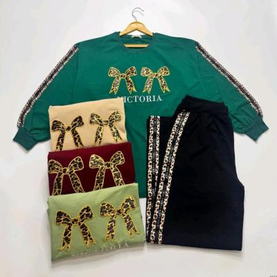 ست بلوز دورس آستین بلند و شلوار بگ زنانه طرح پاپیون