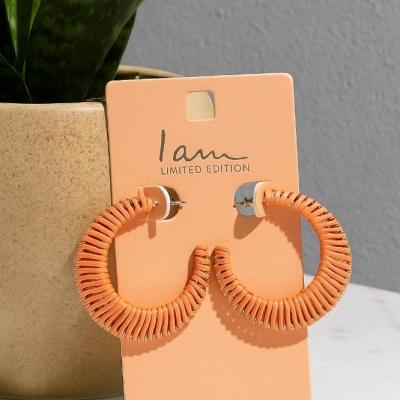 گوشواره حصیری نیم حلقه ای نارنجی برند I am