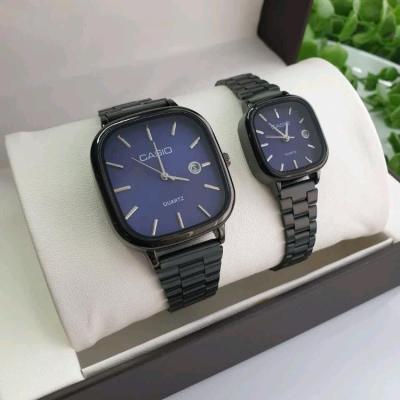 ساعت ست طرح کاسیو زنانه و مردانه بند مشکی صفحه سورمه ای