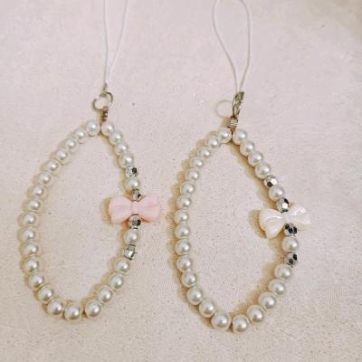 آویز مرواریدی پینترستی گوشی موبایل فونچارم پاپیونی مرواریدی آویز کیف