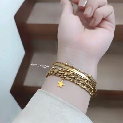 دستبند چهار ردیفه استیل کارتیر وماری و خلخال با آویز ستاره طلایی-154439