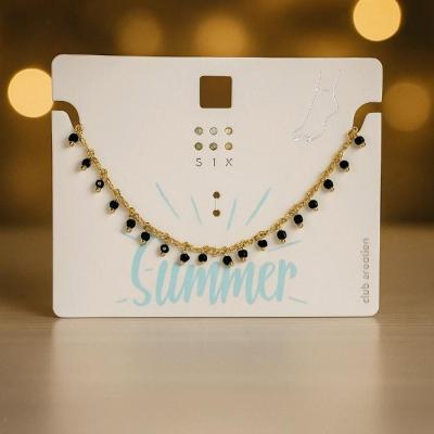 پابند ظریف طلایی با آویزهای مروارید مشکی براق برند six