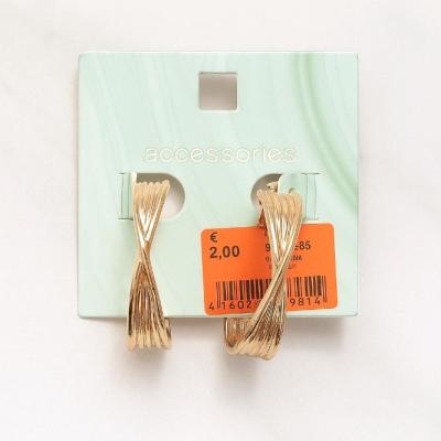 گوشواره طلایی نیم حلقه ای پیچان برند accessories