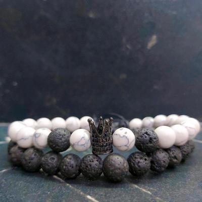 دستبند دو ردیفه سنگ هائولیت و لاوا و تاج سوارسکی