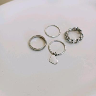پک چهار عددی انگشتر استیل گارنیر و قلب و رینگ استیل و حلقه رنگ نقره ای-157406