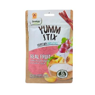 تشویقی سگ دنتالایت مدل YUMM STIX REAL FRUIT طعم ماست، انگور و هلو وزن 70 گرم