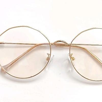 عینک طبی گرد چند ضلعی رنگ طلایی