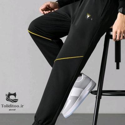 شلوار سه جیب نواری زرد