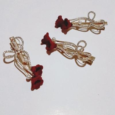 گیره مو انبری گل مخملی،طرح نگین و مرواریدی