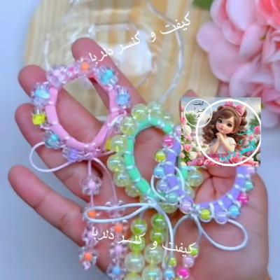 کش مو مرواریدی رنگی بسته 10 عددی