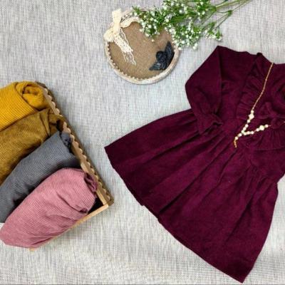 پیراهن دخترانه تک پاپیون آستین بلند دو تکه همراه با گردنبند